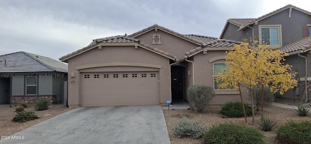 view of front of property featuring a garage