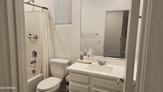 full bathroom featuring shower / bath combination with curtain, vanity, and toilet