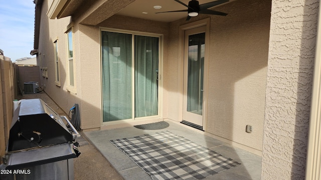 view of patio / terrace featuring ceiling fan, central AC unit, and area for grilling