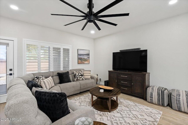 living room featuring ceiling fan