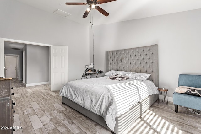 bedroom with light wood-type flooring and ceiling fan