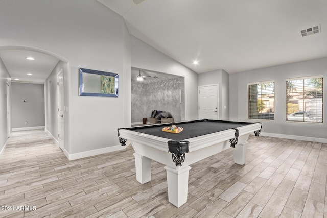 rec room featuring light hardwood / wood-style floors, billiards, and vaulted ceiling