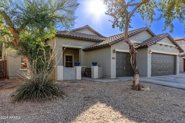 view of side of home with a garage