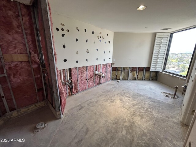 spare room featuring visible vents