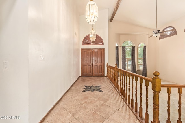 4922 W Fallen Leaf Ln, Glendale, AZ 85310 - foyer entrance with light tile patterned floors, beam ceiling, high vaulted ceiling, and ceiling fan