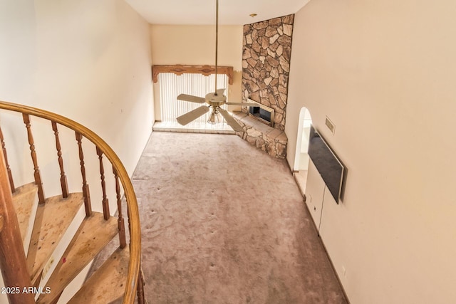4922 W Fallen Leaf Ln, Glendale, AZ 85310 - unfurnished living room featuring carpet flooring, stairway, and a ceiling fan