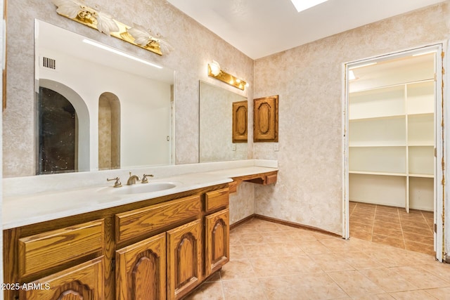4922 W Fallen Leaf Ln, Glendale, AZ 85310 - bathroom with vanity and tile patterned floors
