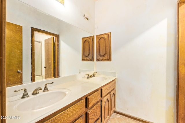 4922 W Fallen Leaf Ln, Glendale, AZ 85310 - bathroom with double vanity and tile patterned floors