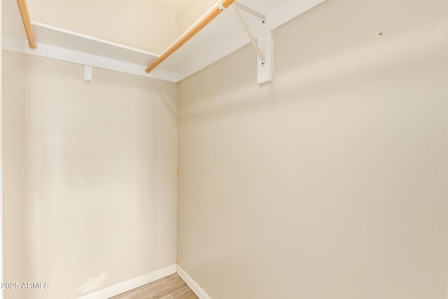 4922 W Fallen Leaf Ln, Glendale, AZ 85310 - spacious closet with light wood-type flooring