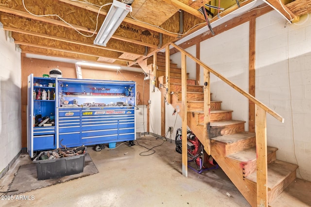 4922 W Fallen Leaf Ln, Glendale, AZ 85310 - basement featuring stairway and concrete block wall