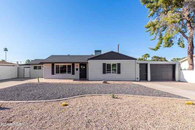 ranch-style home with a garage