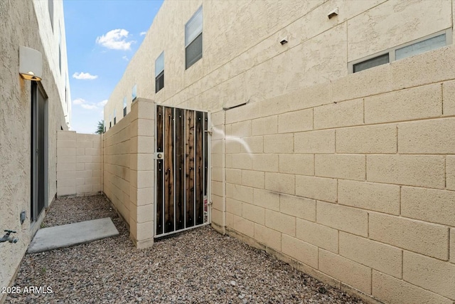 view of side of property featuring a fenced backyard