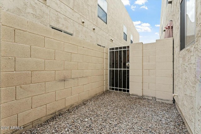 view of home's exterior featuring fence