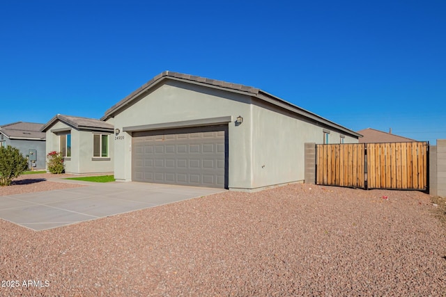 ranch-style home featuring a garage