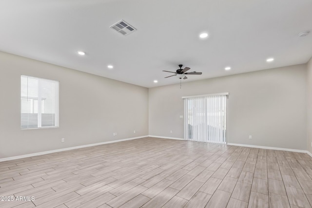 unfurnished room featuring ceiling fan