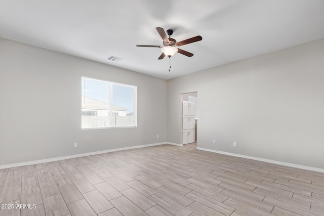 empty room featuring ceiling fan