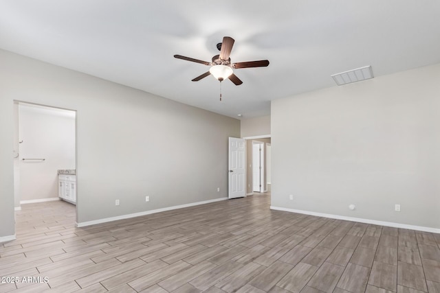 empty room featuring ceiling fan