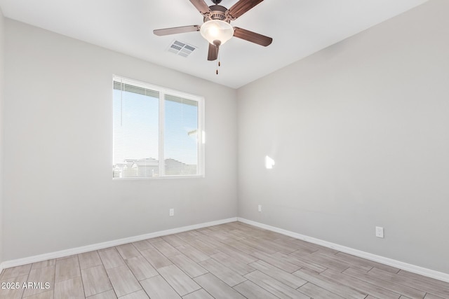 unfurnished room featuring ceiling fan and light hardwood / wood-style floors