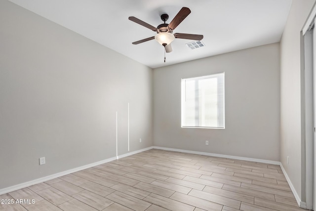 empty room featuring ceiling fan