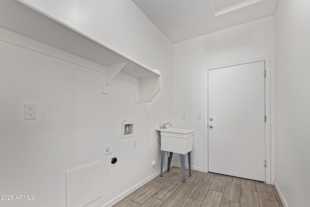 laundry area featuring hookup for a washing machine and hookup for an electric dryer