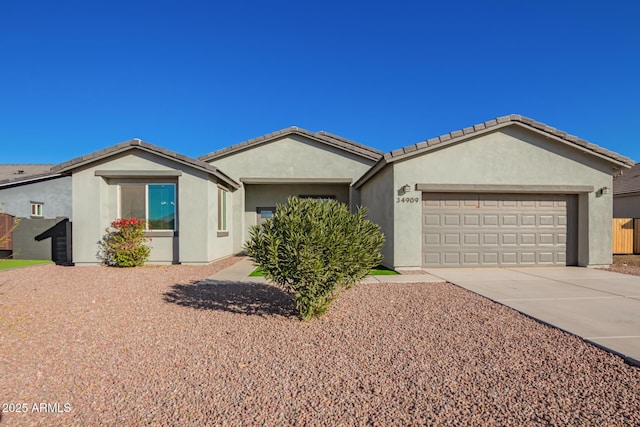 ranch-style home featuring a garage