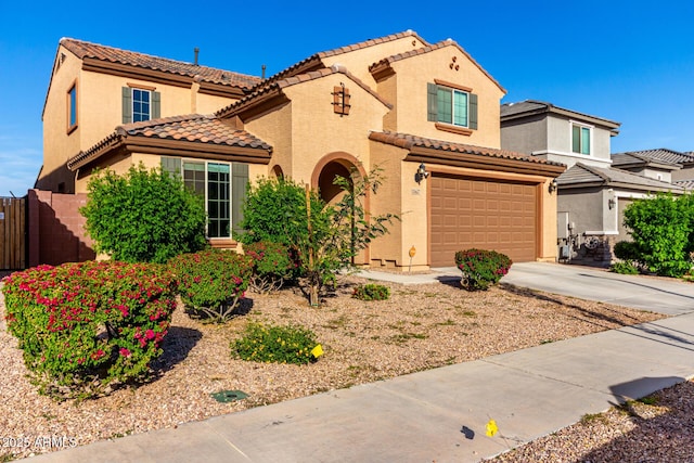 25627 N 163rd Dr, Surprise, AZ 85387 - mediterranean / spanish home with a tile roof, an attached garage, driveway, and stucco siding