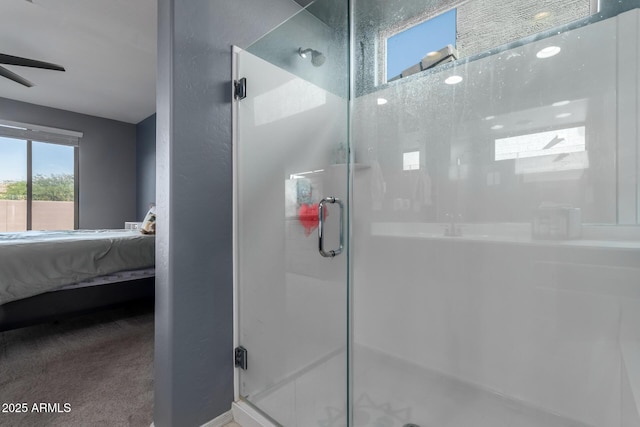 25627 N 163rd Dr, Surprise, AZ 85387 - full bathroom featuring a shower stall, ensuite bathroom, and ceiling fan