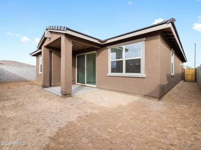 rear view of property with a patio