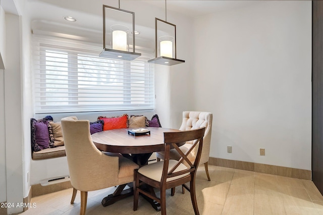 view of tiled dining space