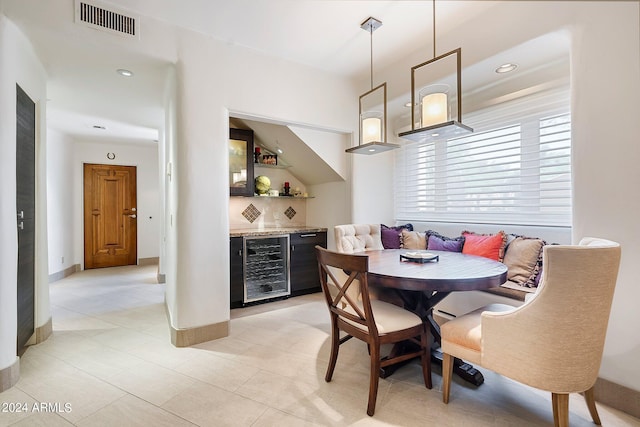 tiled dining area with beverage cooler