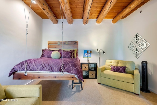 carpeted bedroom featuring beamed ceiling and wooden ceiling