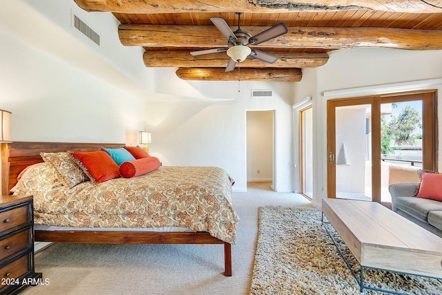 carpeted bedroom featuring ceiling fan, beam ceiling, and wooden ceiling