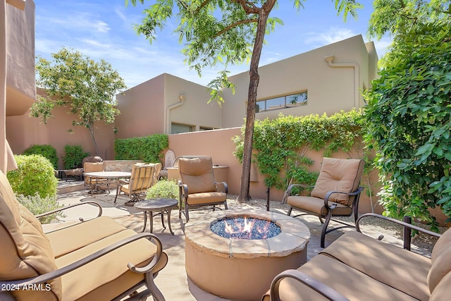 view of patio featuring a fire pit