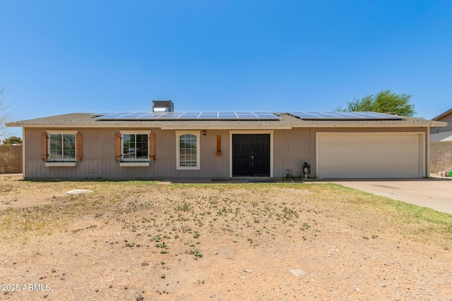 1676 W Sequoia Dr, Phoenix, AZ 85027 - ranch-style home featuring an attached garage, solar panels, and driveway