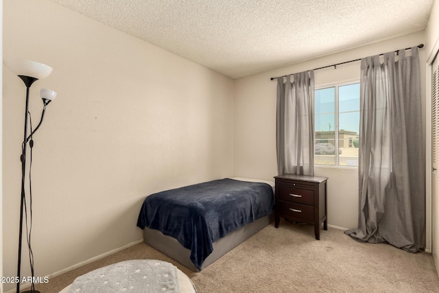 1676 W Sequoia Dr, Phoenix, AZ 85027 - carpeted bedroom with a textured ceiling and baseboards