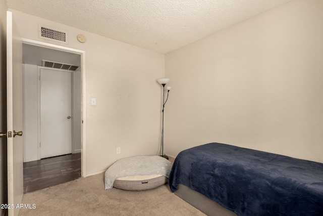 1676 W Sequoia Dr, Phoenix, AZ 85027 - carpeted bedroom featuring a textured ceiling