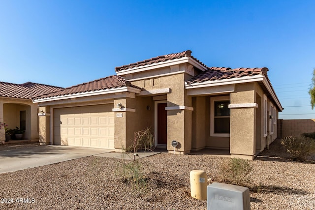 view of front of home with a garage