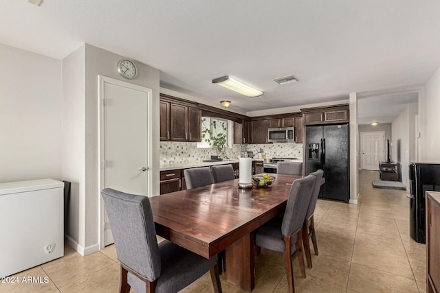 view of tiled dining area