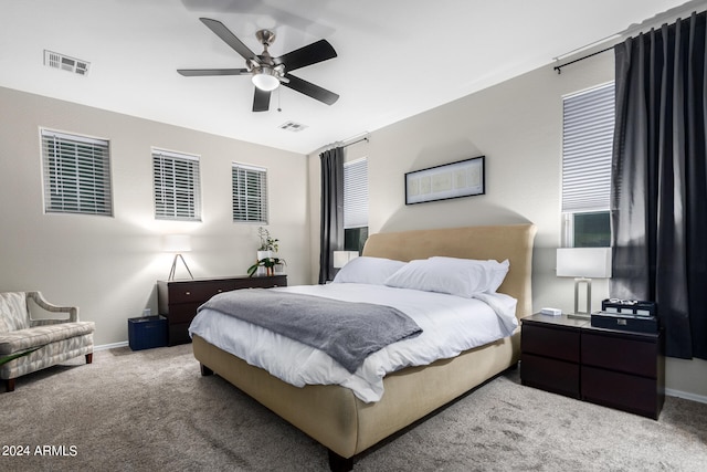 carpeted bedroom featuring ceiling fan