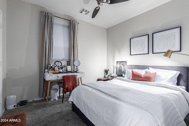 bedroom featuring dark colored carpet and ceiling fan