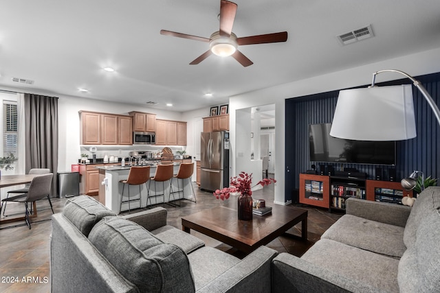 living room with ceiling fan