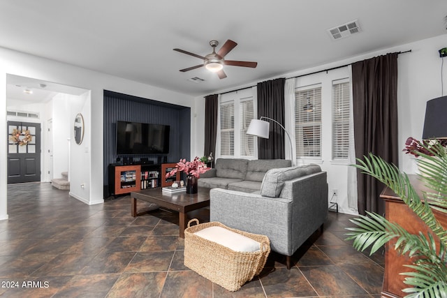 living room featuring ceiling fan