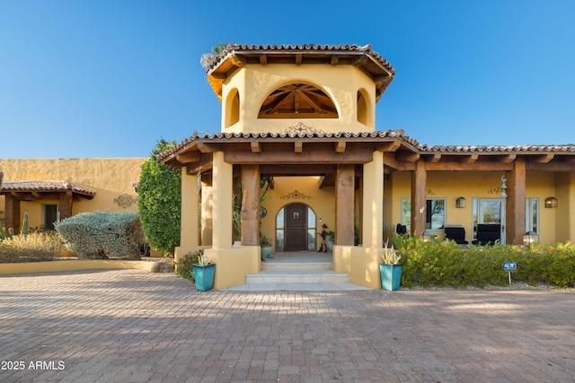 exterior space with stucco siding