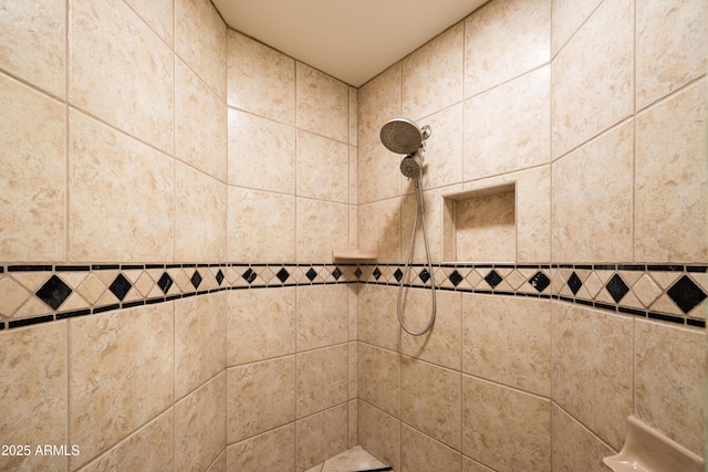 details with a tile shower