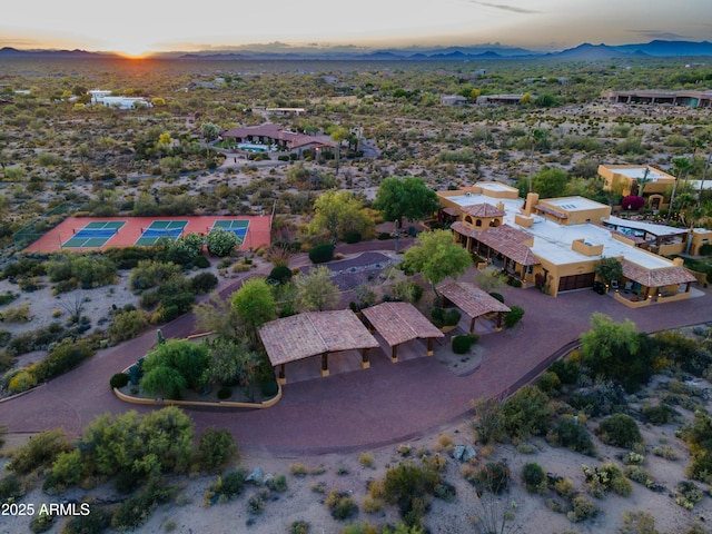 drone / aerial view featuring a mountain view