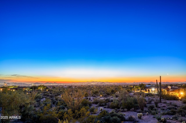 nature at dusk featuring a mountain view