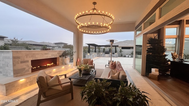 view of patio / terrace featuring an outdoor living space with a fireplace