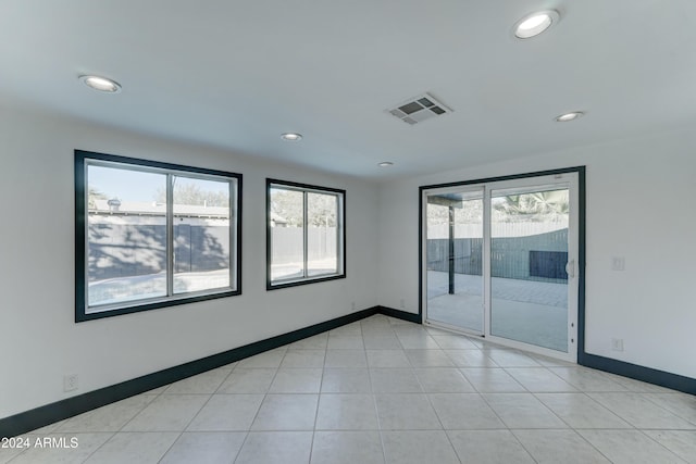 empty room featuring light tile patterned flooring