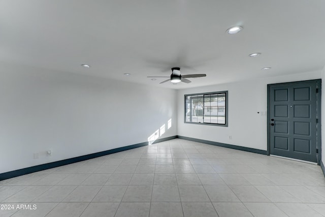 unfurnished room featuring ceiling fan