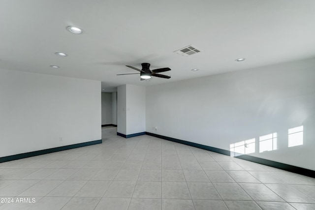 spare room with ceiling fan